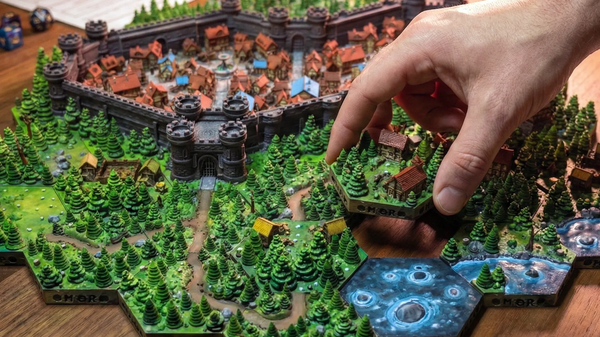 Master of Realms physical 3D-printed hex terrain tile placement for tabletop RPG worldbuilding